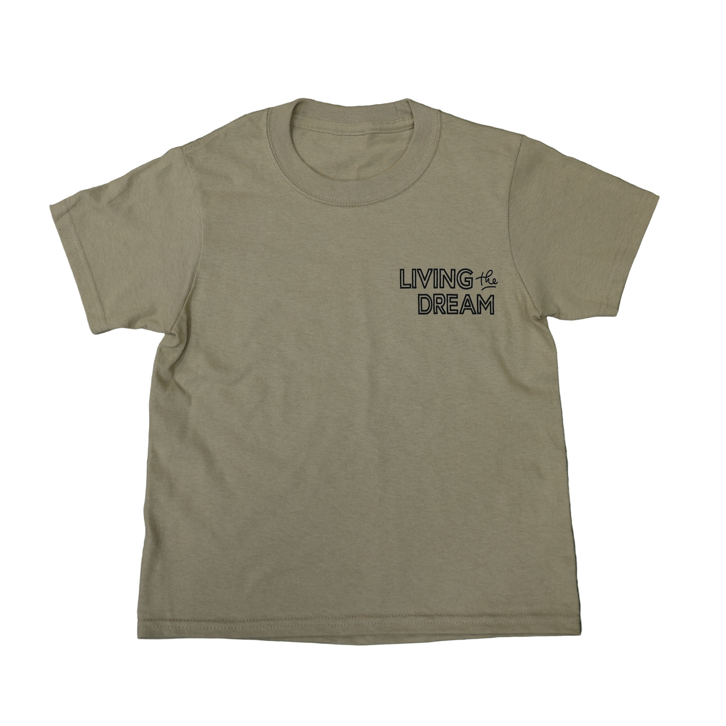Beige t-shirt with 'Living the Dream' text on a textured surface