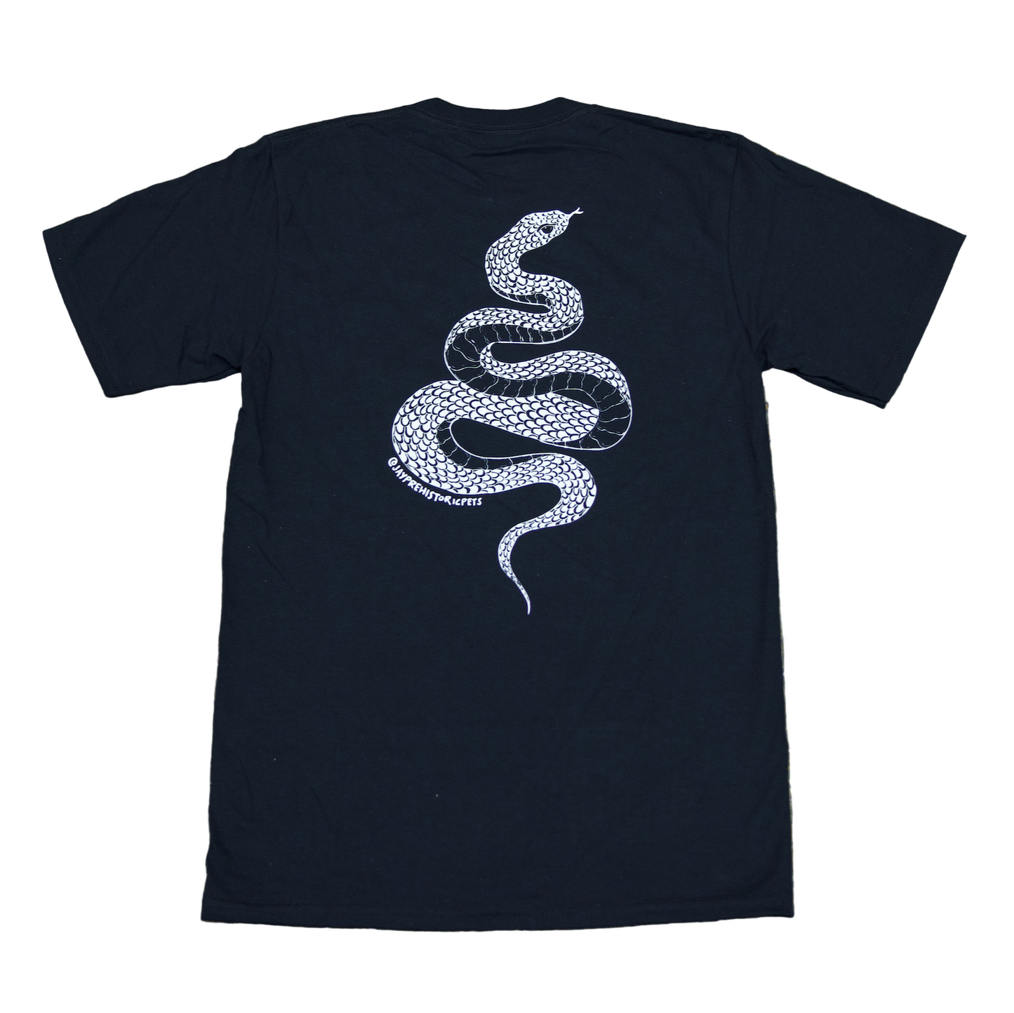 Black t-shirt with a white snake design on a textured surface