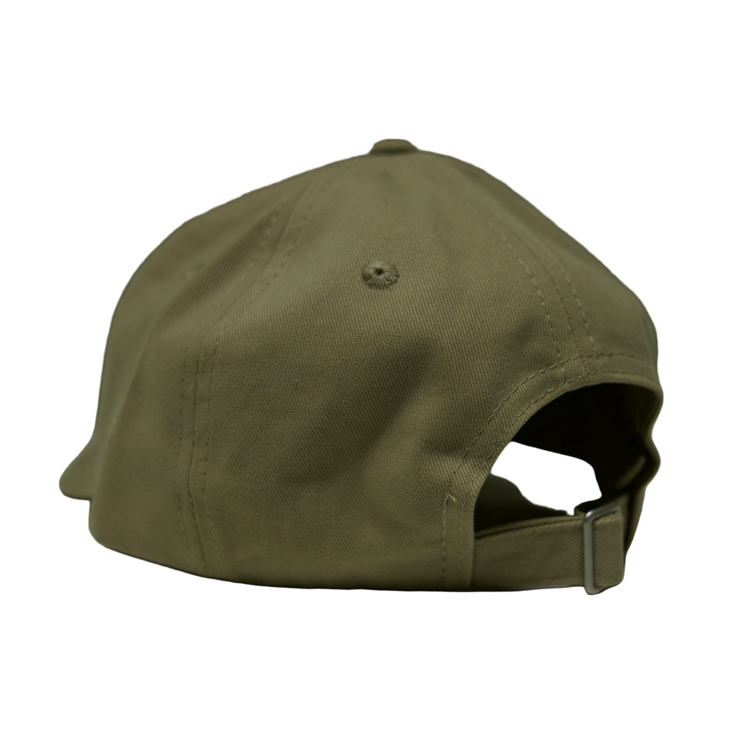 Brown cap on a light gray surface with a neutral background